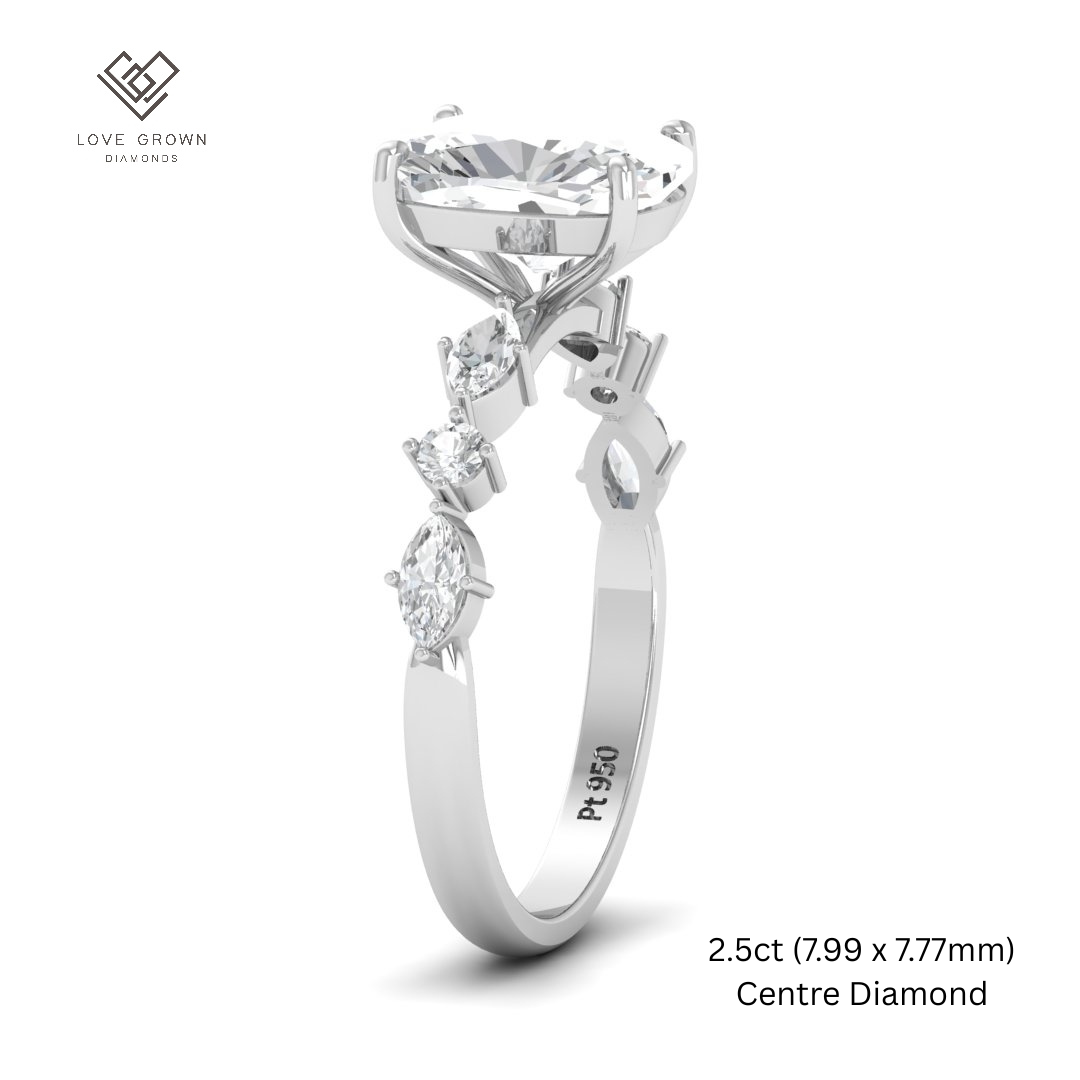 Elizabeth Cushion Diamond Engagement Ring With A Marquise and Round Cut Diamond Band