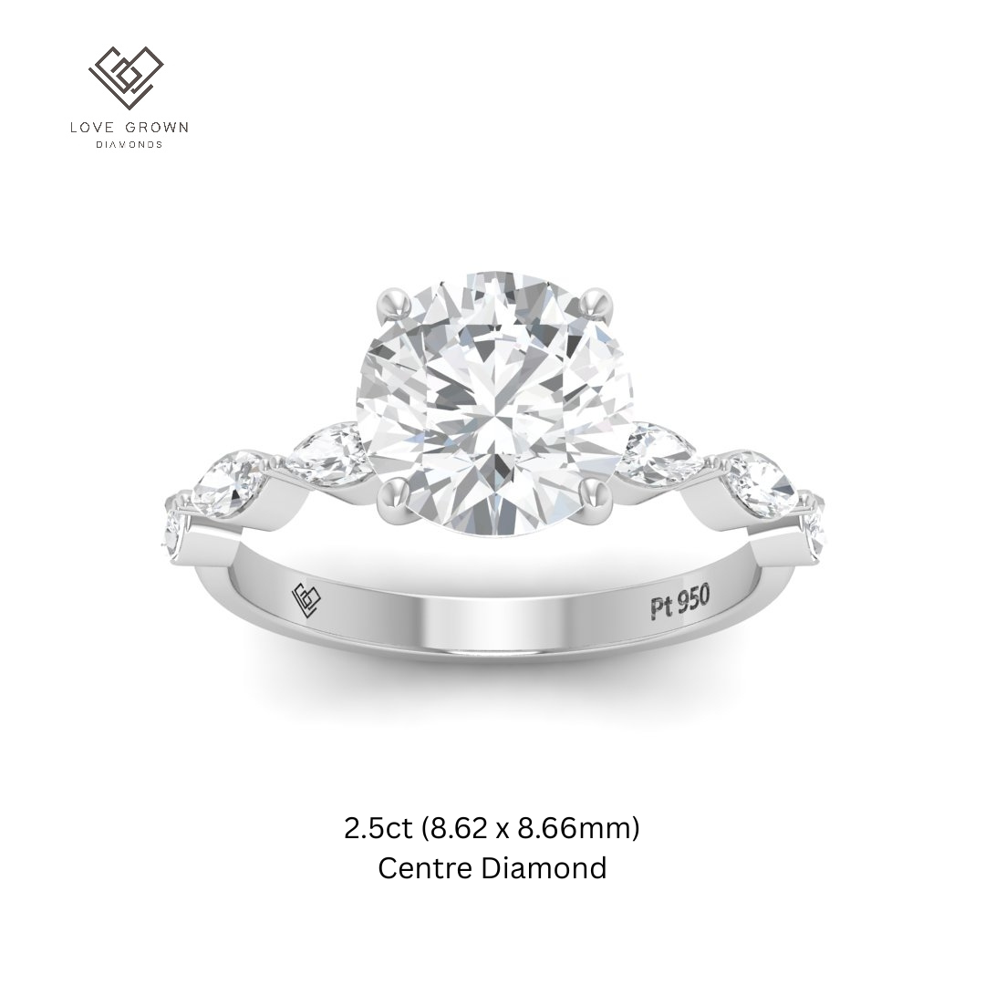 Kasandra Round Brilliant Cut Diamond Engagement Ring With A Marquise Cut Diamond Band