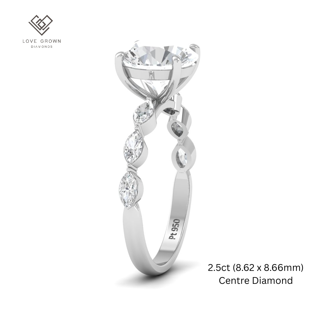 Kasandra Round Brilliant Cut Diamond Engagement Ring With A Marquise Cut Diamond Band