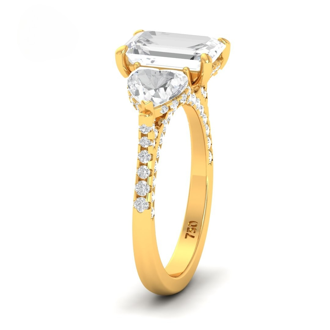 Victoria Emerald Cut Diamond Engagement Ring with Heart Cut Side Diamonds and 3D Diamond Band