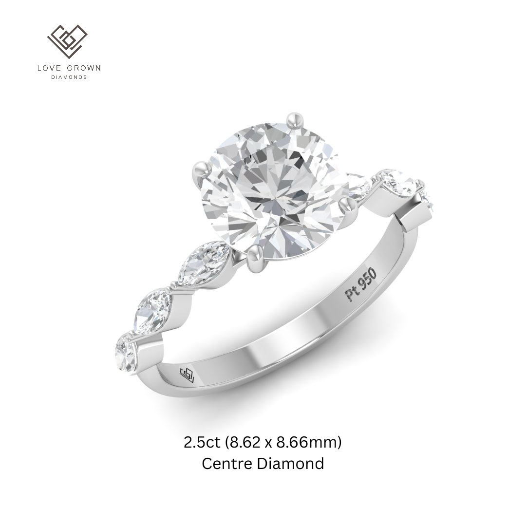 Kasandra Round Brilliant Cut Diamond Engagement Ring With A Marquise Cut Diamond Band