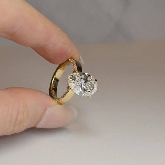 Celeste Oval cut Lab Diamond with Cigar band and half set Diamond Sides & Hidden Halo
