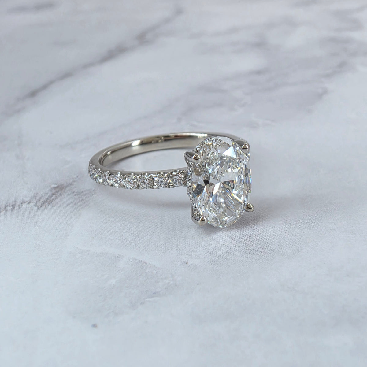 Chloé Oval Cut Diamond Engagement Ring with Diamond Hidden Halo and Diamond Band