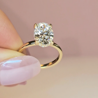 Léa Oval Cut Diamond With Hidden Halo Engagement Ring