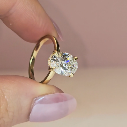 Léa Oval Cut Diamond With Hidden Halo Engagement Ring