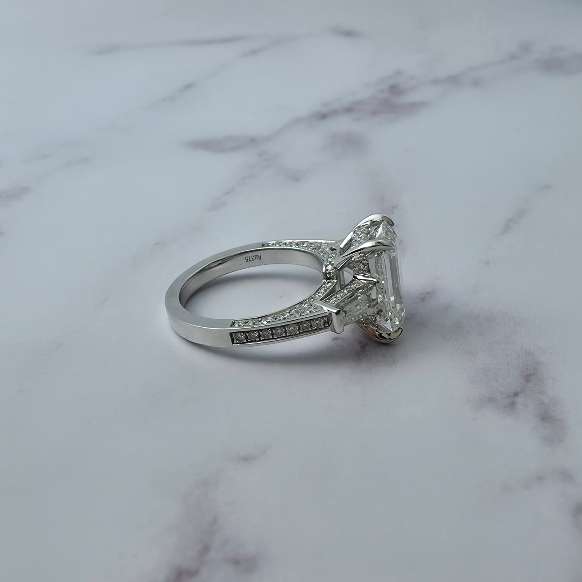 Mary Emerald Cut Diamond Engagement Ring with Tapering Baguette Cut Side Diamonds
