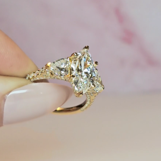Victoria Marquise Cut Diamond Engagement Ring with Heart Cut Side Diamonds and 3D Diamond Band