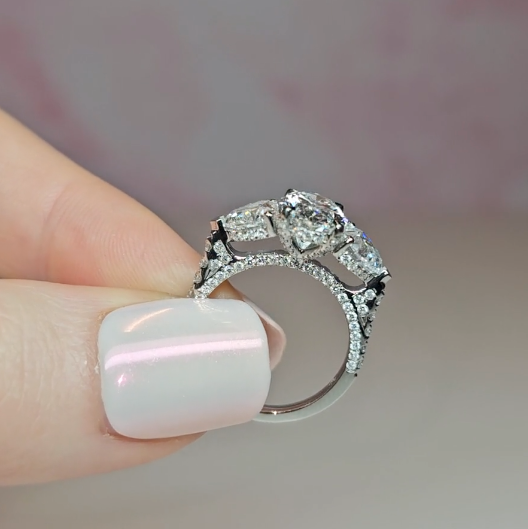 Victoria Oval Cut Diamond Engagement Ring with Heart Cut Side Diamonds and 3D Diamond Band