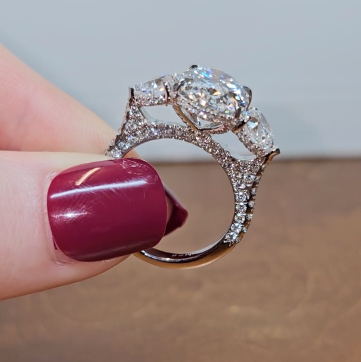 Victoria Oval Cut Diamond Engagement Ring with Heart Cut Side Diamonds and 3D Diamond Band