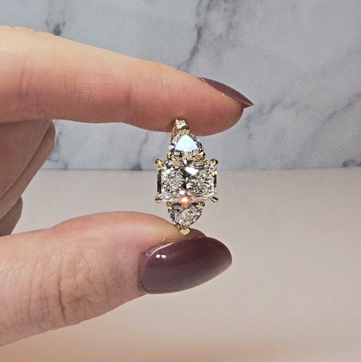 Victoria Radiant Cut Diamond Engagement Ring with Heart Cut Side Diamonds and 3D Diamond Band