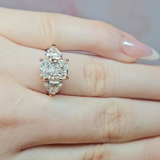 Victoria Radiant Cut Diamond Engagement Ring with Heart Cut Side Diamonds and 3D Diamond Band