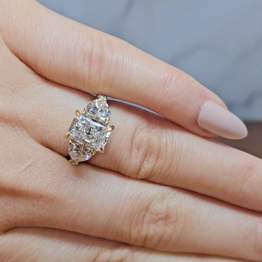 Victoria Radiant Cut Diamond Engagement Ring with Heart Cut Side Diamonds and 3D Diamond Band
