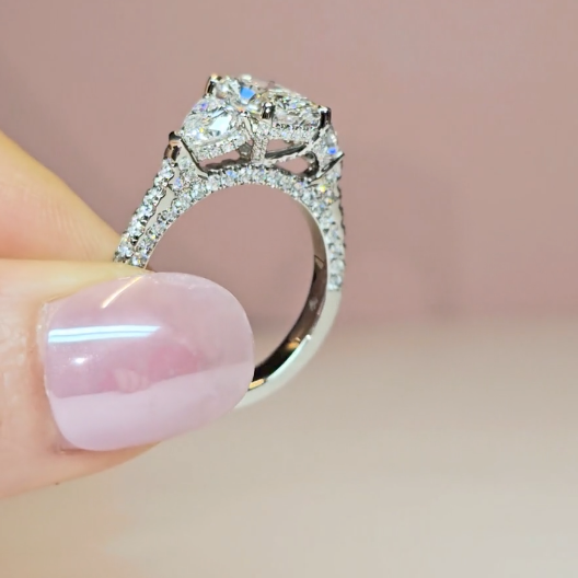 Victoria Radiant Cut Diamond Engagement Ring with Heart Cut Side Diamonds and 3D Diamond Band