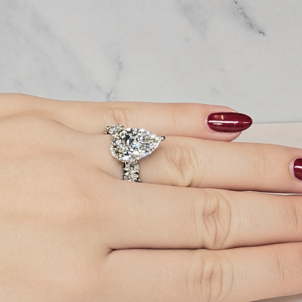 Vivien Pear Brilliant Cut Engagement Ring with Pear Brilliant Diamond Band and Wrap Around Hidden Halo
