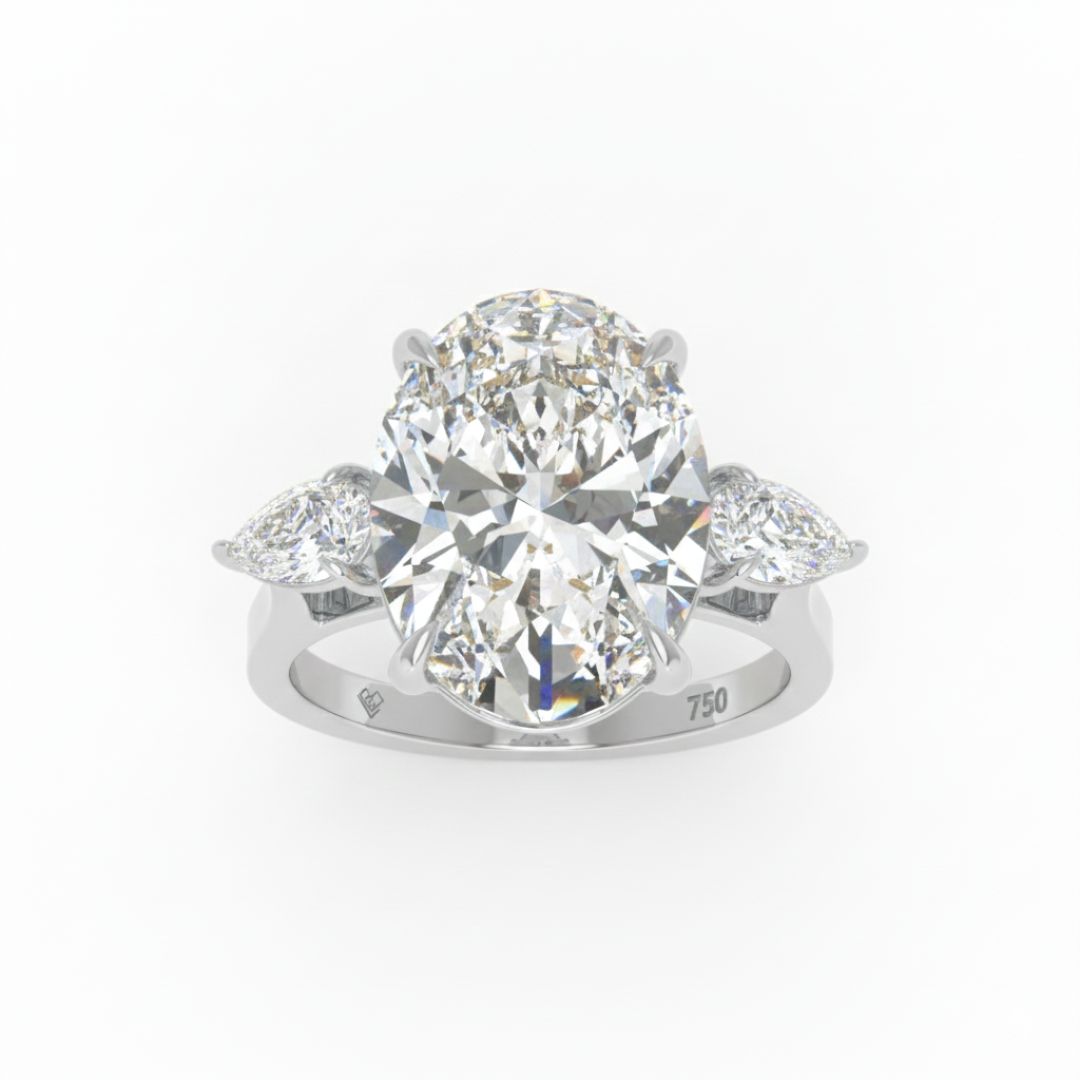 Sofia Oval Cut Diamond Engagement Ring With A Pear Cut Side Diamonds