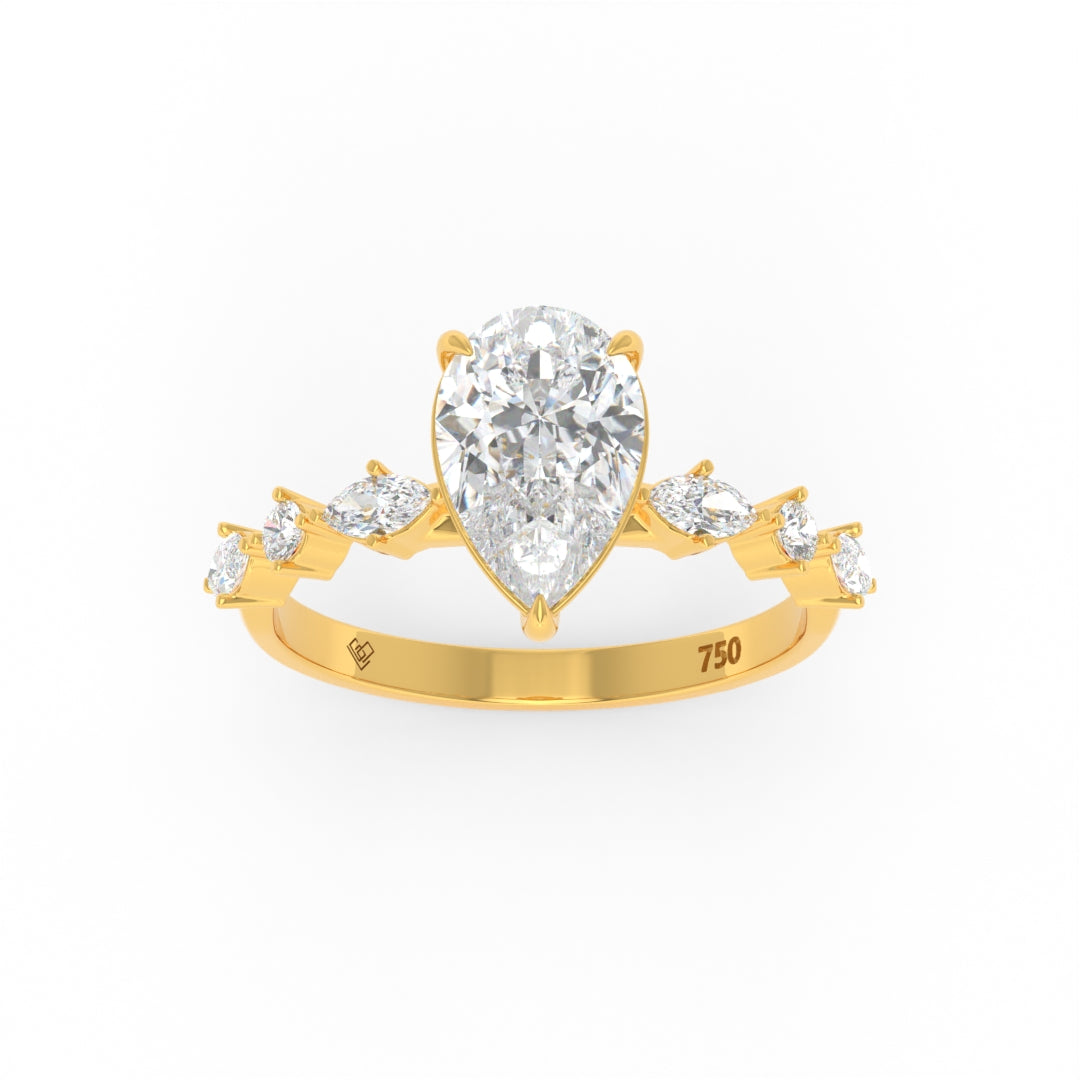 Elizabeth Pear Cut Diamond engagement ring with pear-shaped center stone and marquise and round cut diamonds on a yellow gold band