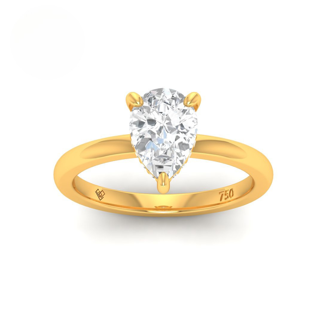Léa Pear Cut Diamond engagement ring with hidden halo set in 18k gold band