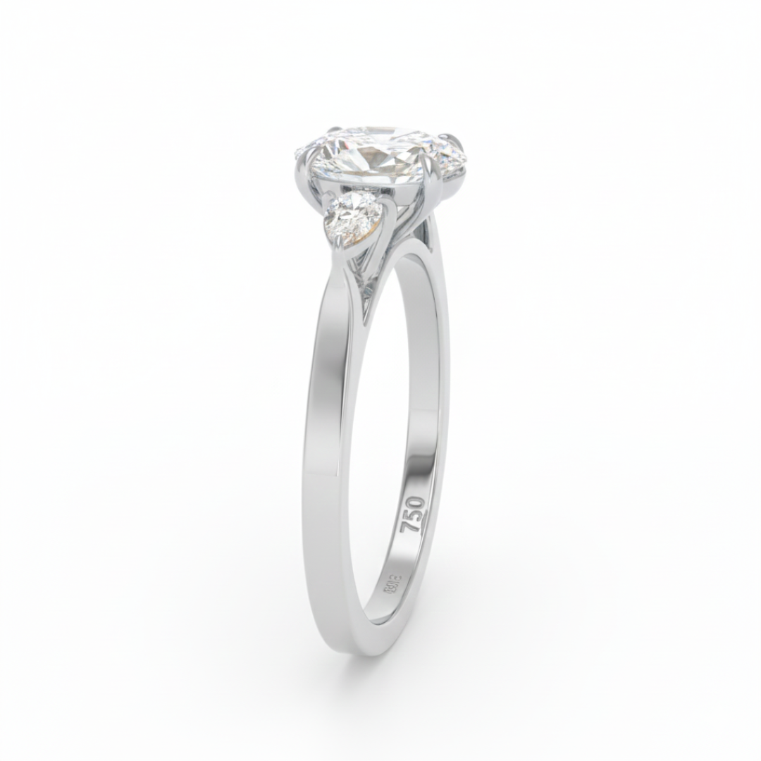 Sofia Oval Cut Diamond Engagement Ring With A Pear Cut Side Diamonds
