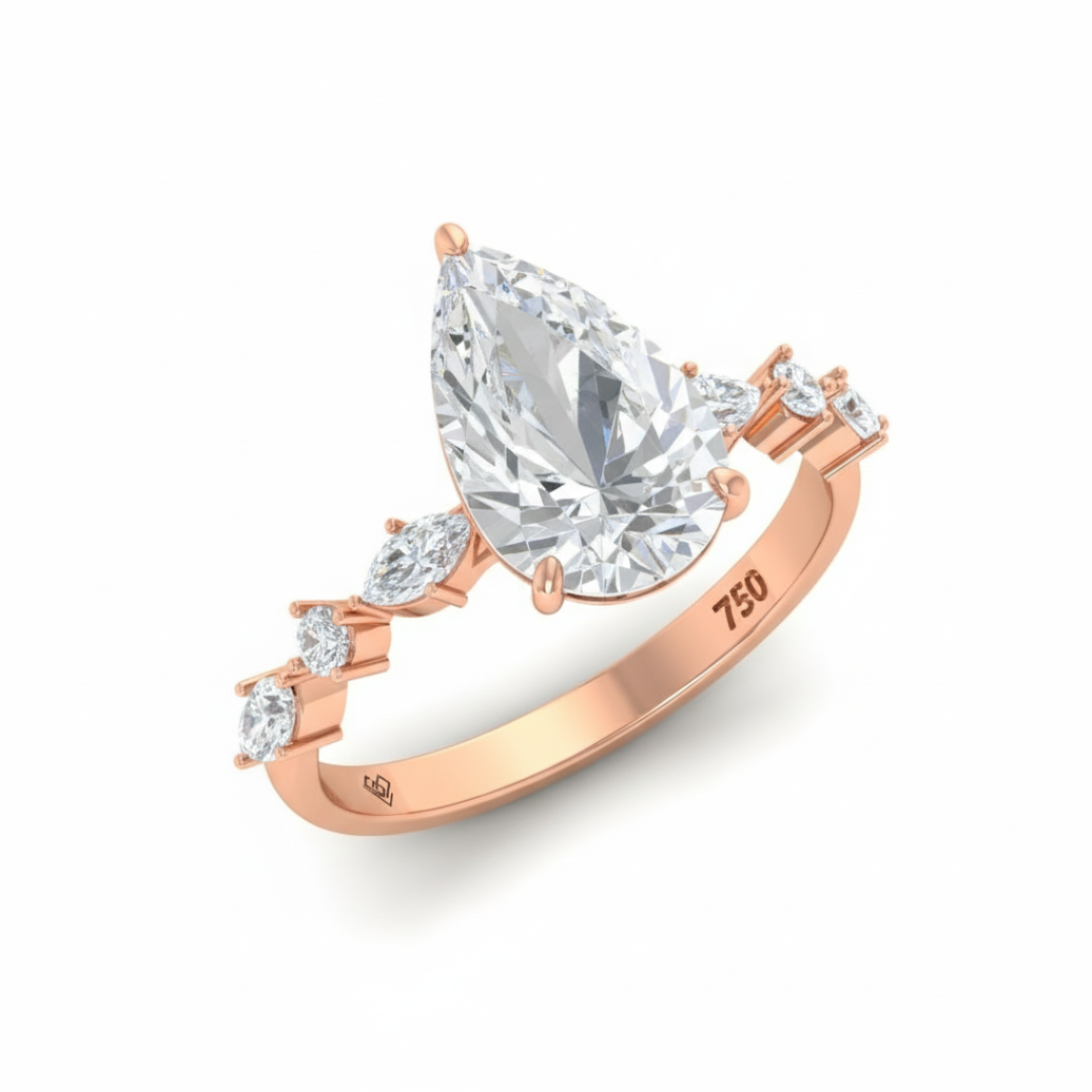 Elizabeth Pear Cut Diamond Engagement Ring With A Marquise And Round Cut Diamond Band