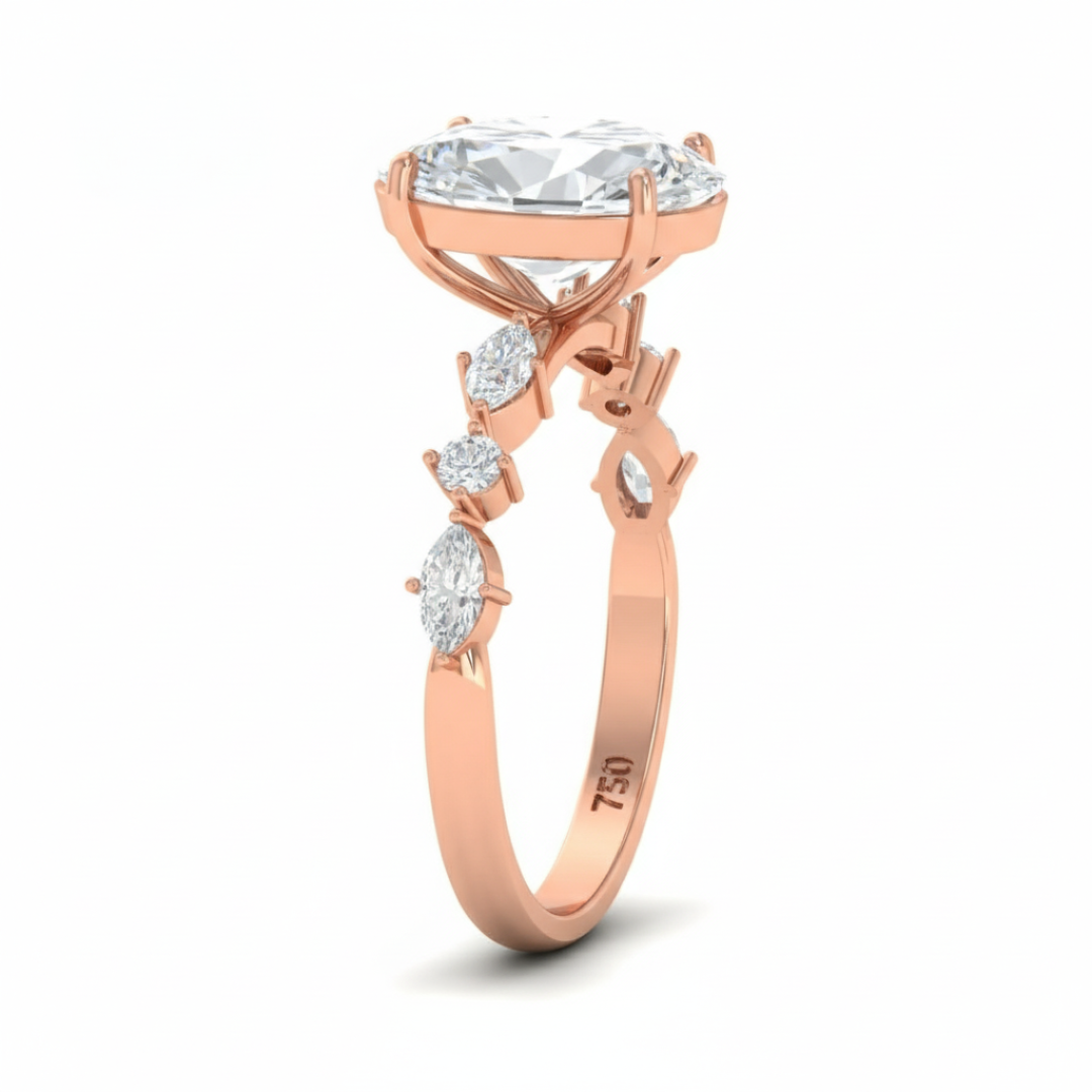Elizabeth Oval Cut Diamond Engagement Ring With A Marquise And Round Cut Diamond Band.