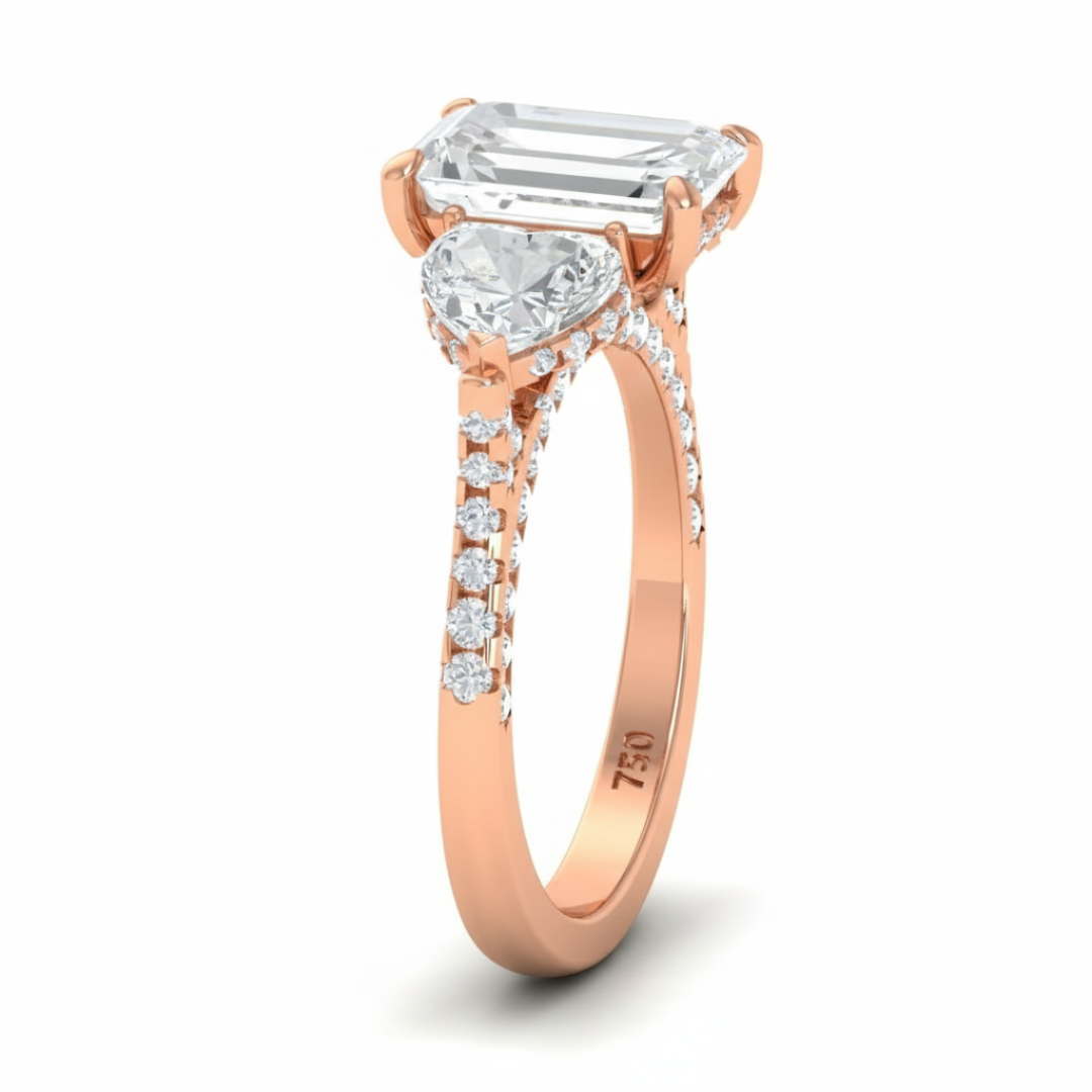 Victoria Emerald Cut Diamond Engagement Ring with Heart Cut Side Diamonds and 3D Diamond Band