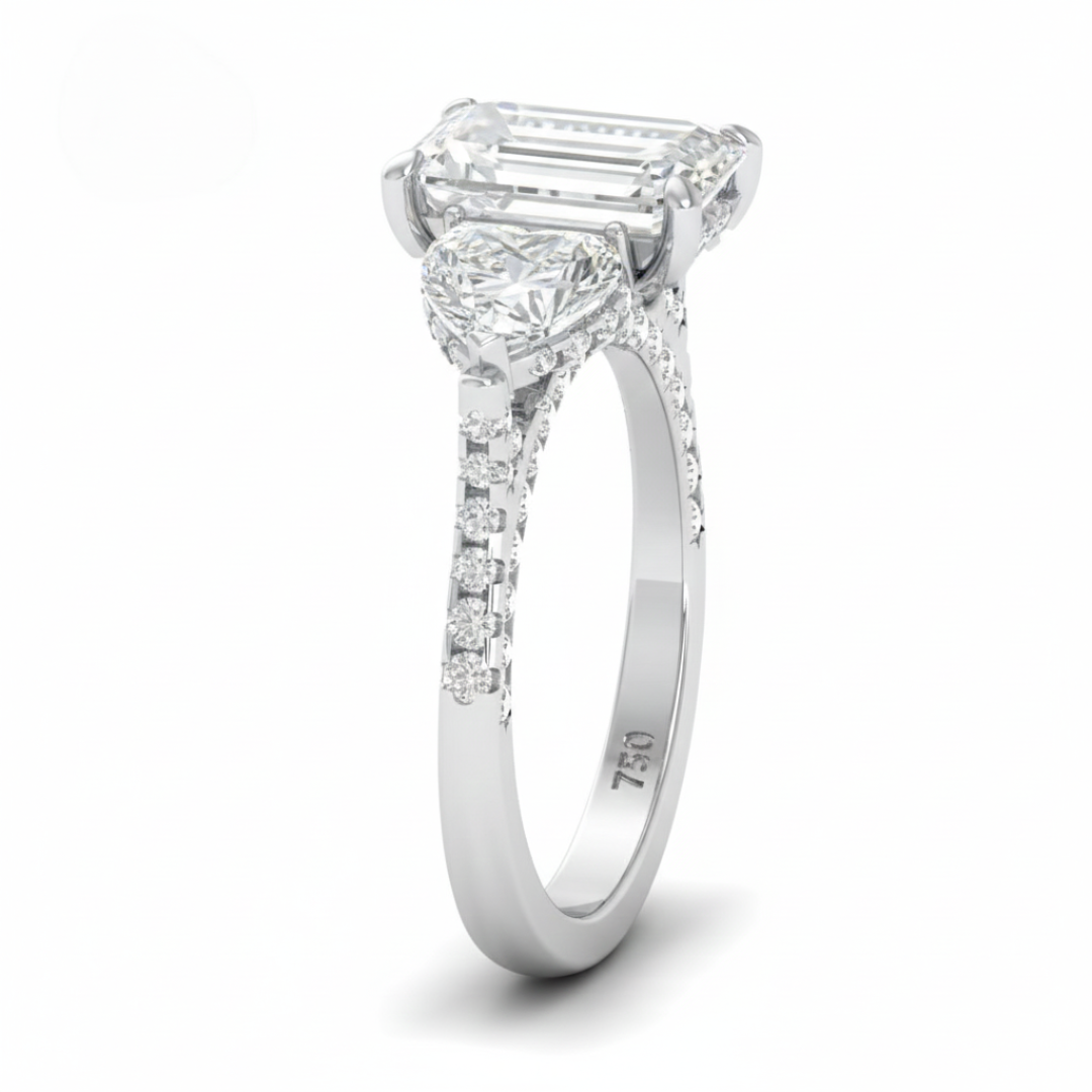 Victoria Emerald Cut Diamond Engagement Ring with Heart Cut Side Diamonds and 3D Diamond Band