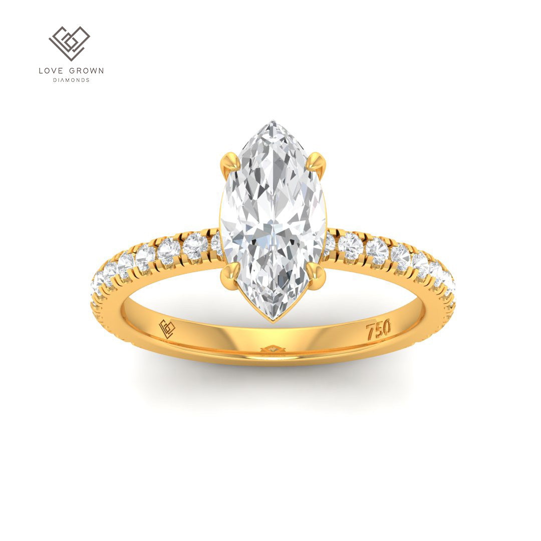Abigail Marquise engagement ring with diamond band, featuring a marquise cut solitaire diamond in platinum 4 claw mount.