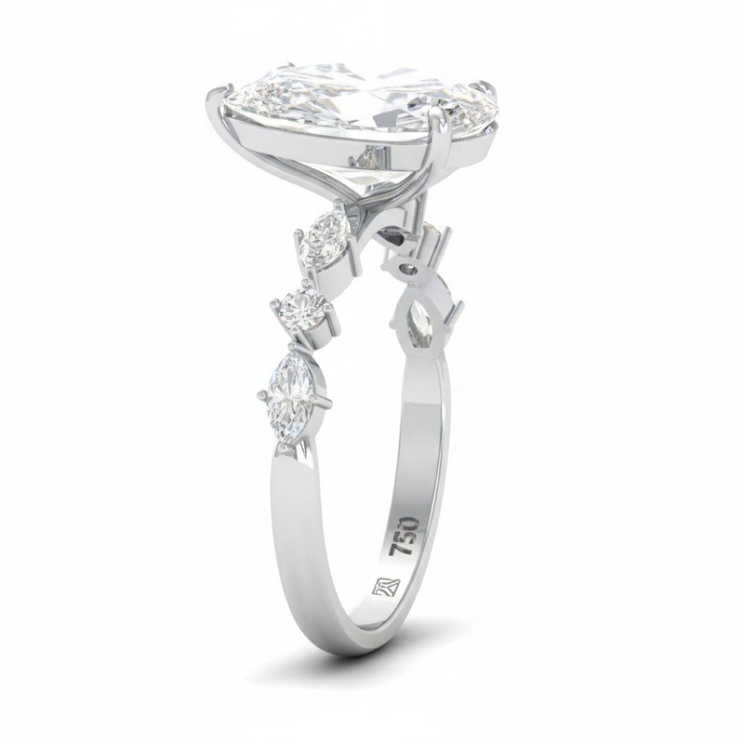 Elizabeth Pear Cut Diamond Engagement Ring With A Marquise And Round Cut Diamond Band