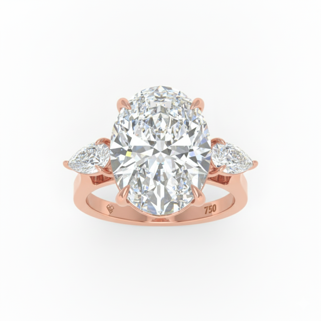 Sofia Oval Cut Diamond Engagement Ring With A Pear Cut Side Diamonds