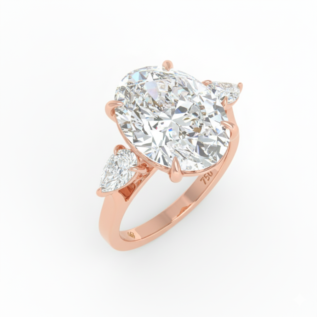 Sofia Oval Cut Diamond Engagement Ring With A Pear Cut Side Diamonds