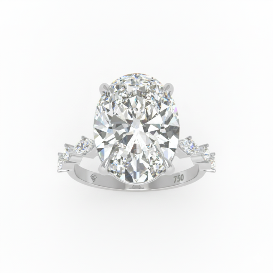 Elizabeth Oval Cut Diamond Engagement Ring With A Marquise And Round Cut Diamond Band.