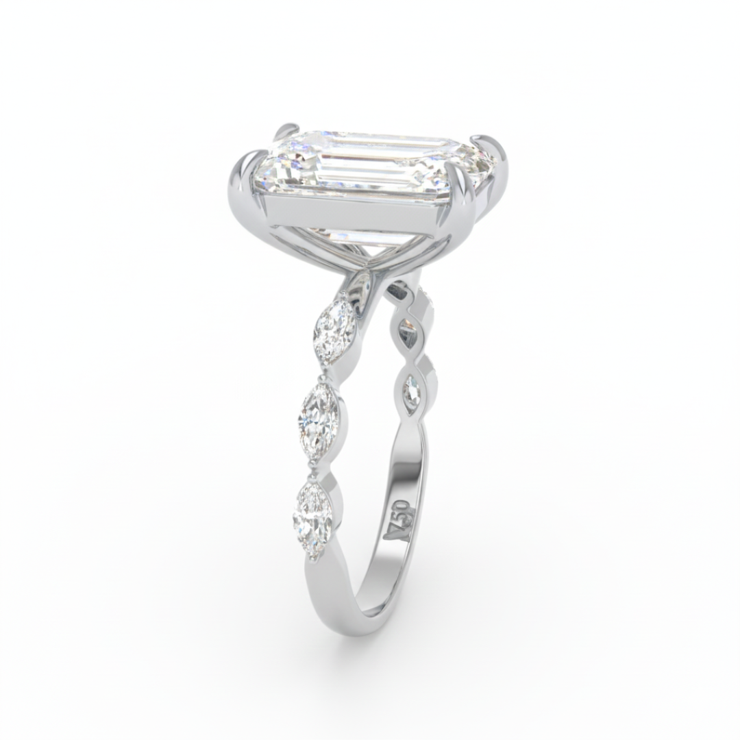 卡桑德拉祖母綠切割鑽石訂婚戒指，搭配馬眼形切割鑽石戒圈