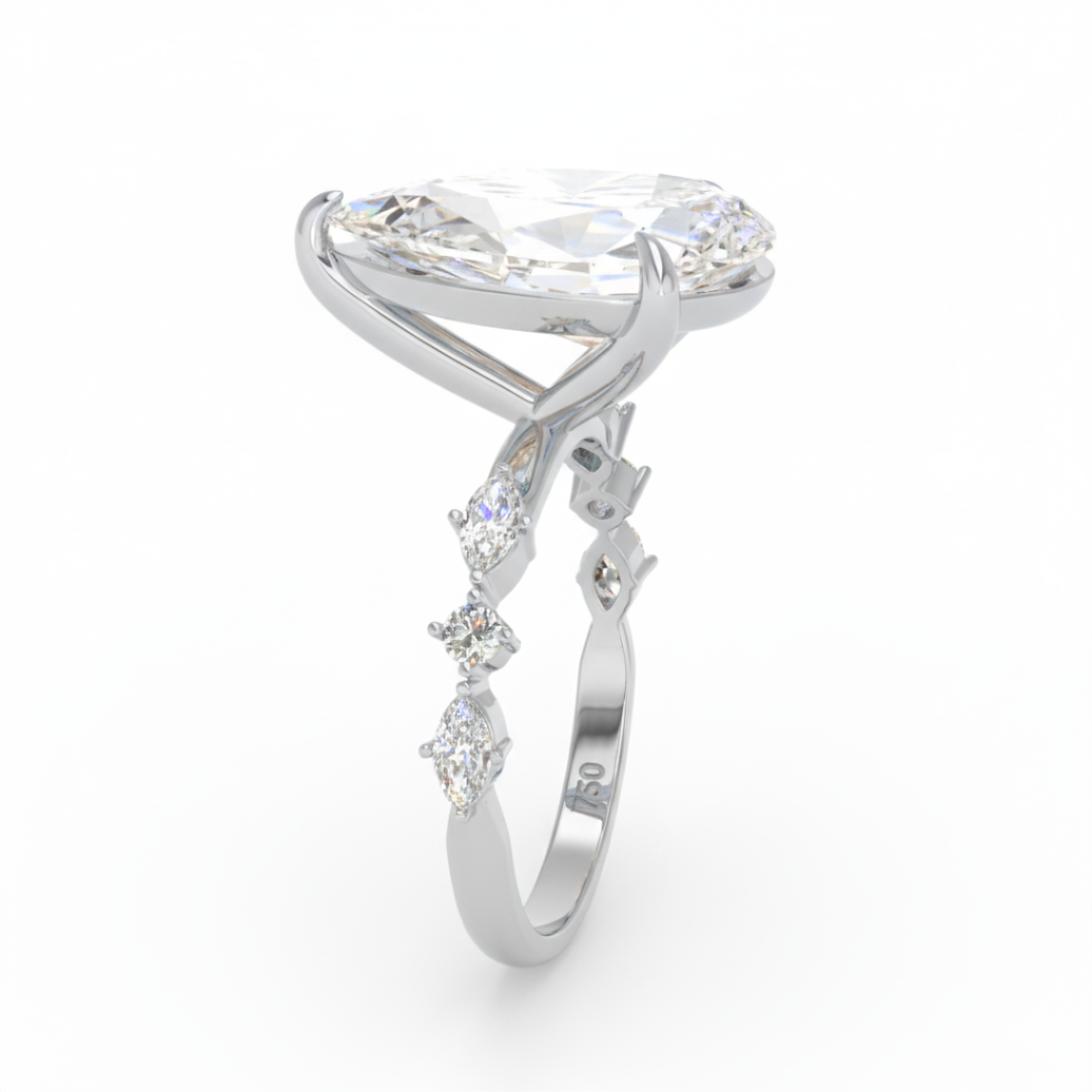 Elizabeth Pear Cut Diamond Engagement Ring With A Marquise And Round Cut Diamond Band