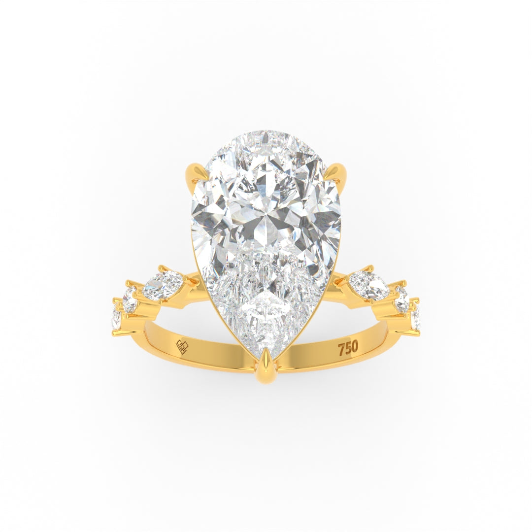Elizabeth Pear Cut Diamond Engagement Ring With A Marquise And Round Cut Diamond Band