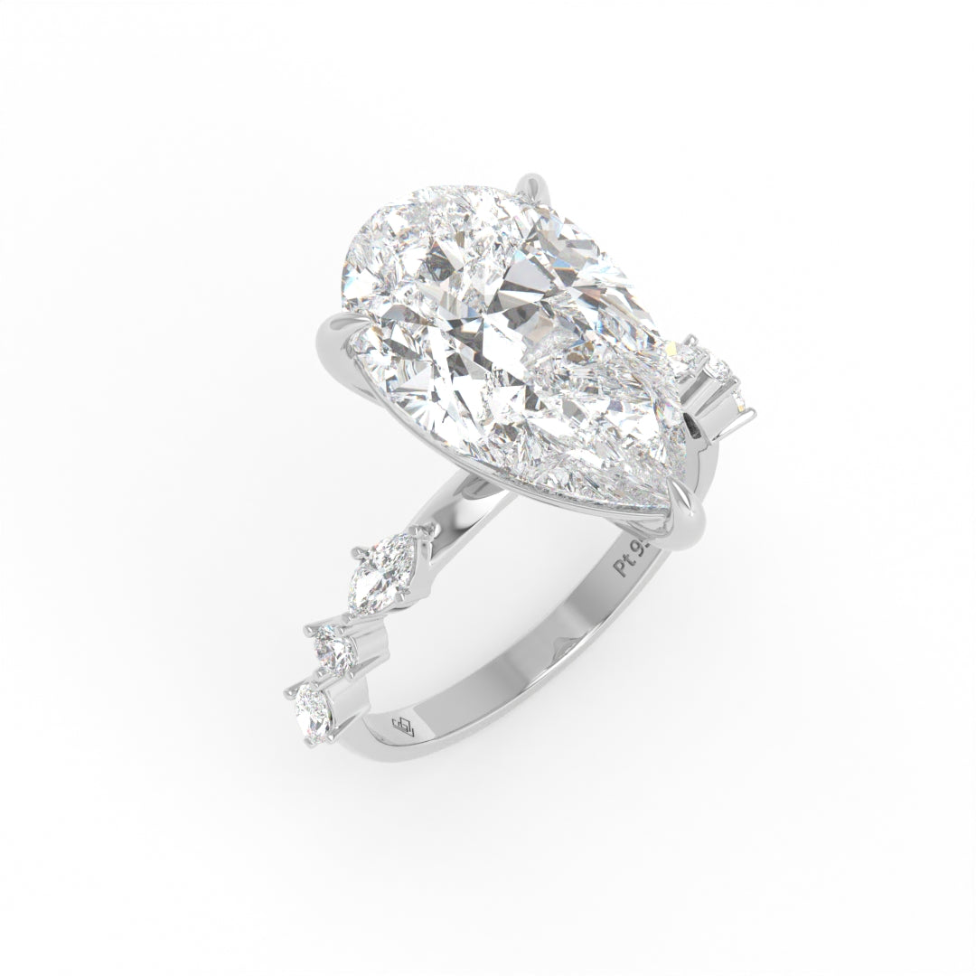 Elizabeth Pear Cut Diamond Engagement Ring With A Marquise And Round Cut Diamond Band