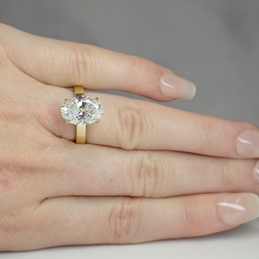 Celeste Oval cut Lab Diamond with Cigar band and half set Diamond Sides & Hidden Halo