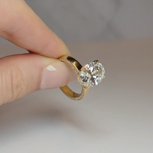 Celeste Oval cut Lab Diamond with Cigar band and half set Diamond Sides & Hidden Halo