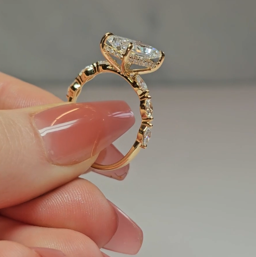 Kasandra Radiant Cut Diamond Engagement Ring With A Marquise Cut Diamond Band