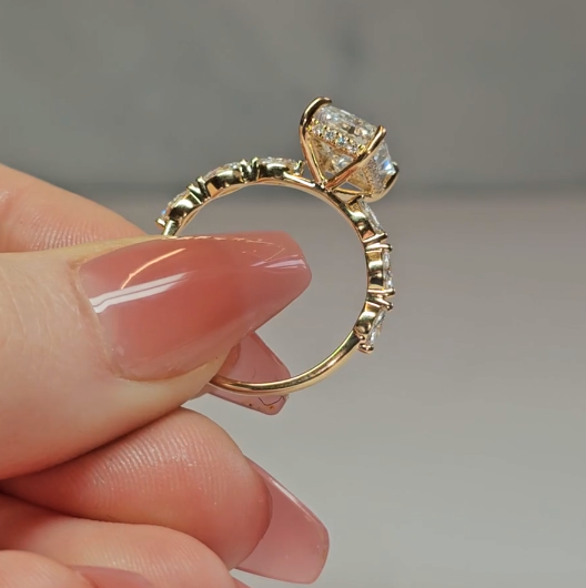 Kasandra Radiant Cut Diamond Engagement Ring With A Marquise Cut Diamond Band