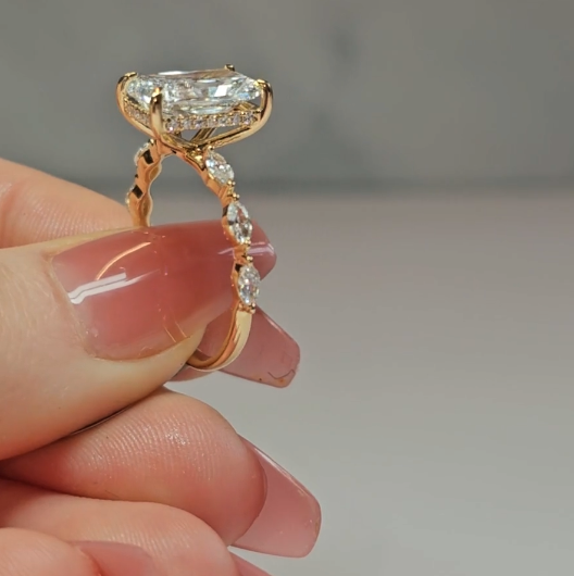 Kasandra Radiant Cut Diamond Engagement Ring With A Marquise Cut Diamond Band