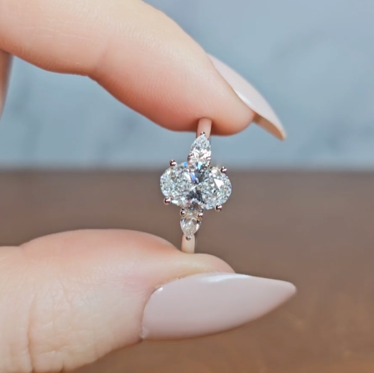 Sofia Oval Cut Diamond Engagement Ring With A Pear Cut Side Diamonds