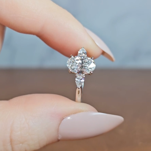 Sofia Oval Cut Diamond Engagement Ring With A Pear Cut Side Diamonds