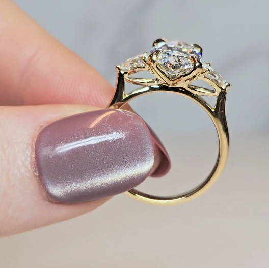 Sofia Oval Cut Diamond Engagement Ring With A Pear Cut Side Diamonds