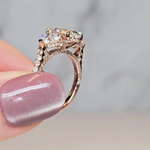 Victoria Oval Cut Diamond Engagement Ring with Heart Cut Side Diamonds and 3D Diamond Band