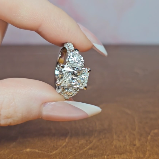 Victoria Radiant Cut Diamond Engagement Ring with Heart Cut Side Diamonds and 3D Diamond Band