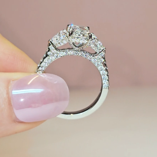 Victoria Radiant Cut Diamond Engagement Ring with Heart Cut Side Diamonds and 3D Diamond Band