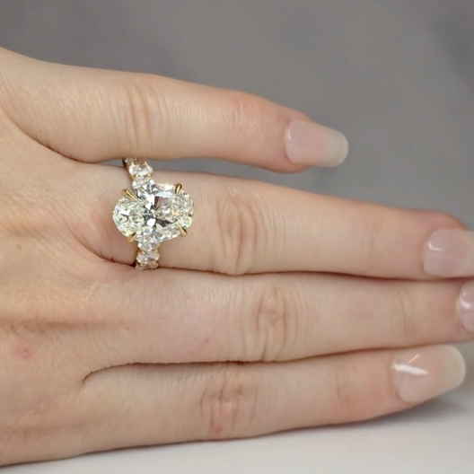 Vivien Oval Brilliant Cut Engagement Ring with Oval Brilliant Diamond Band and Wrap Around Hidden Halo